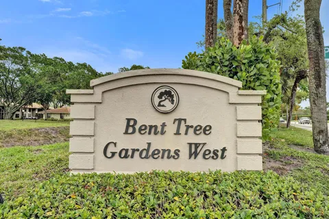 a sign that is on the side of a park