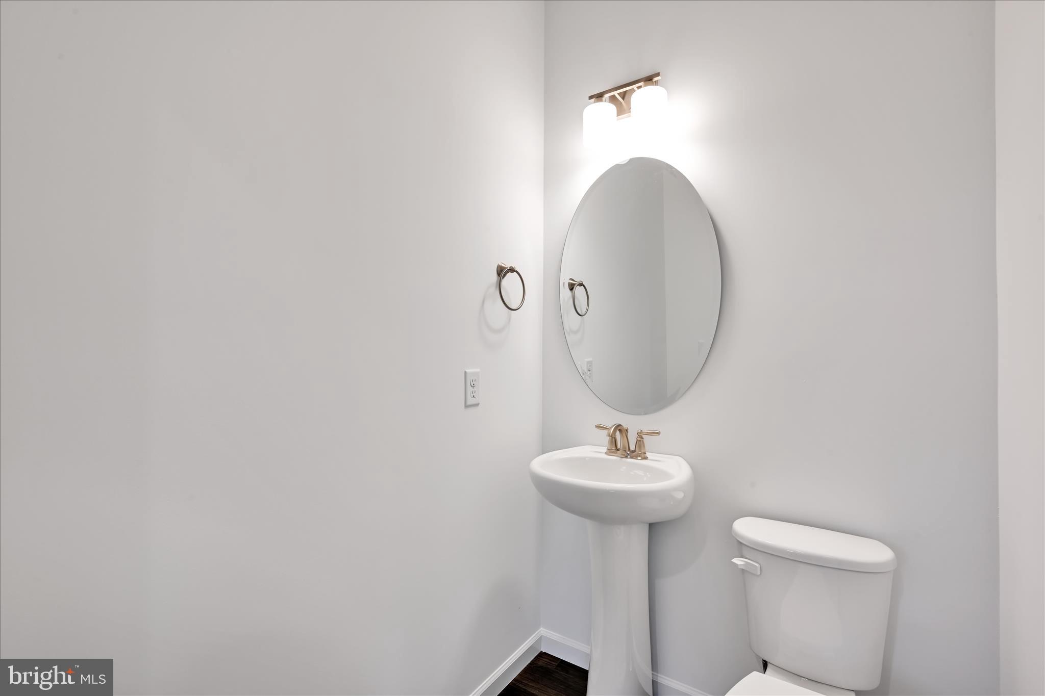 10659 Jonestown Road Annville, PA 17003 - Photo 14 of 32 a bathroom with a sink a mirror and a toilet