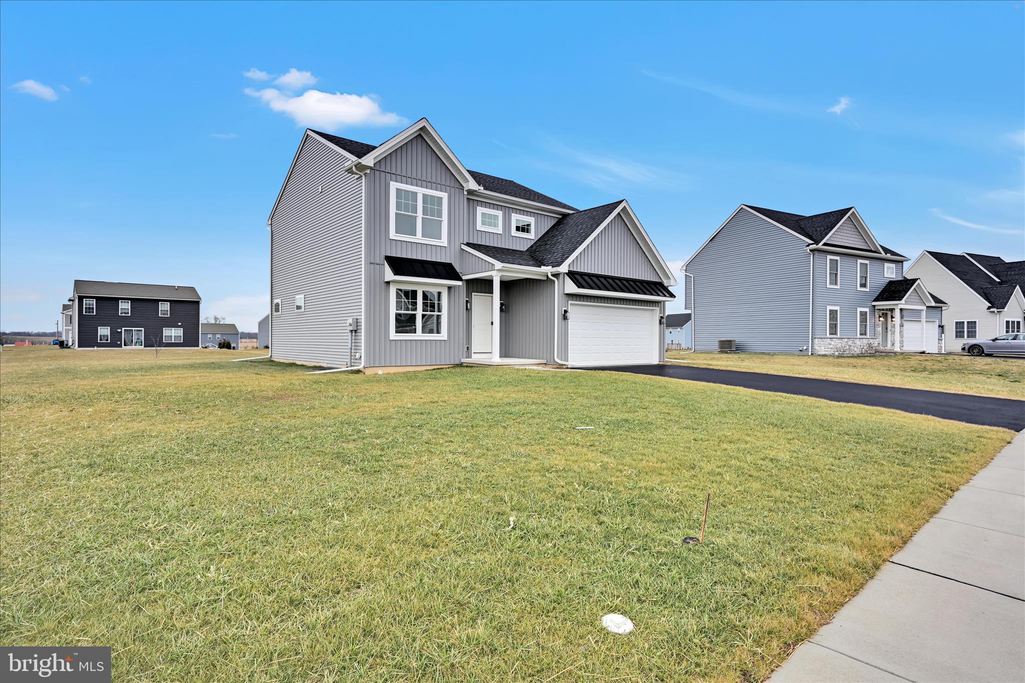 10659 Jonestown Road Annville, PA 17003 - Photo 2 of 32 a front view of a house with garden