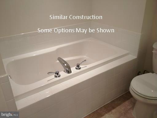 1136 Stallion Street Ranson, WV 25438 - Photo 11 of 23 a bathroom with a sink and a toilet