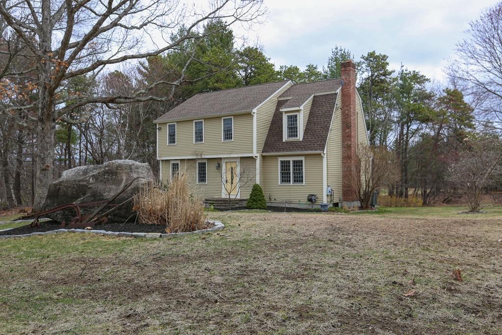 323 Sugar Road Bolton, MA 01740 - Photo 2 of 35 a view of a house with a yard