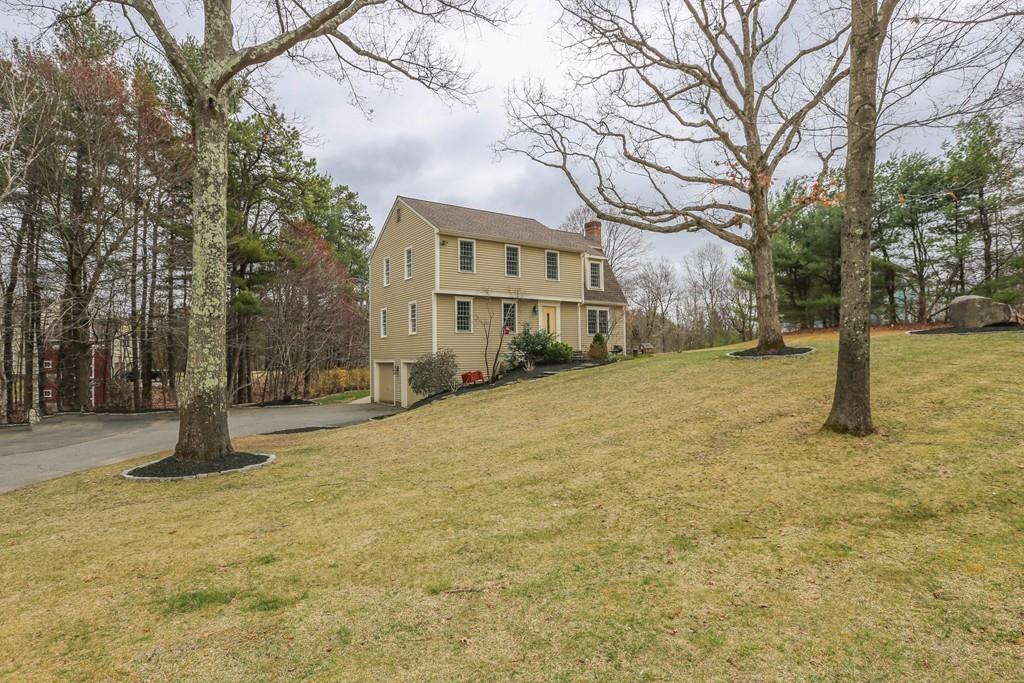 323 Sugar Road Bolton, MA 01740 - Photo 35 of 35 a view of a yard with a house