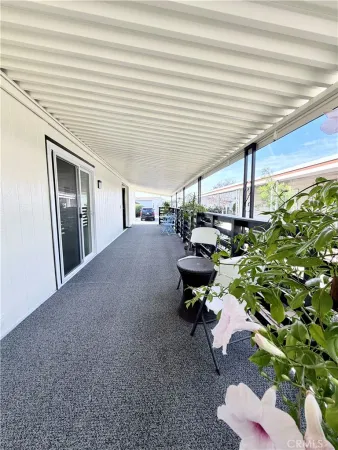 a view living room with wooden floor and furniture
