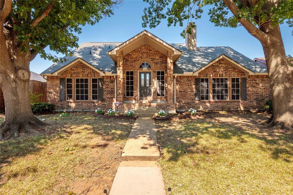 4108 Fryer Street The Colony, TX 75056 - Photo 1 of 27 a front view of a house with a yard