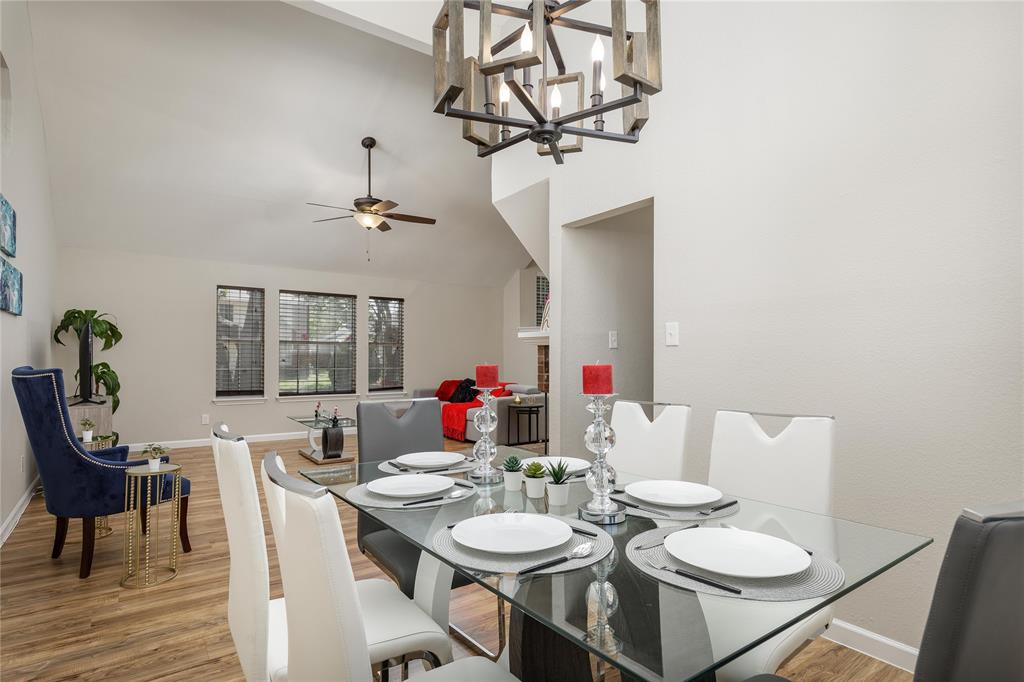 4108 Fryer Street The Colony, TX 75056 - Photo 11 of 27 a view of a dining room with furniture and wooden floor