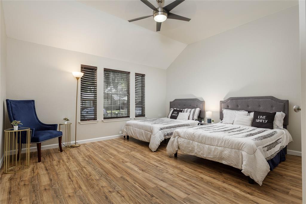 4108 Fryer Street The Colony, TX 75056 - Photo 15 of 27 a bedroom with a bed a window and a piano