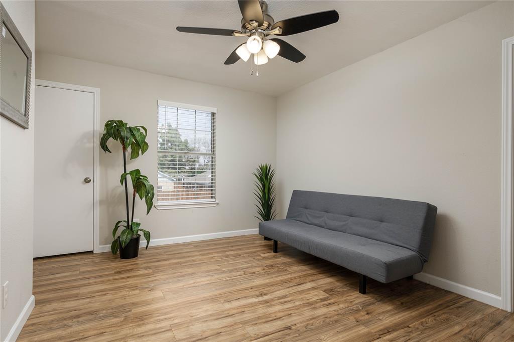 4108 Fryer Street The Colony, TX 75056 - Photo 20 of 27 a living room with furniture and a potted plant
