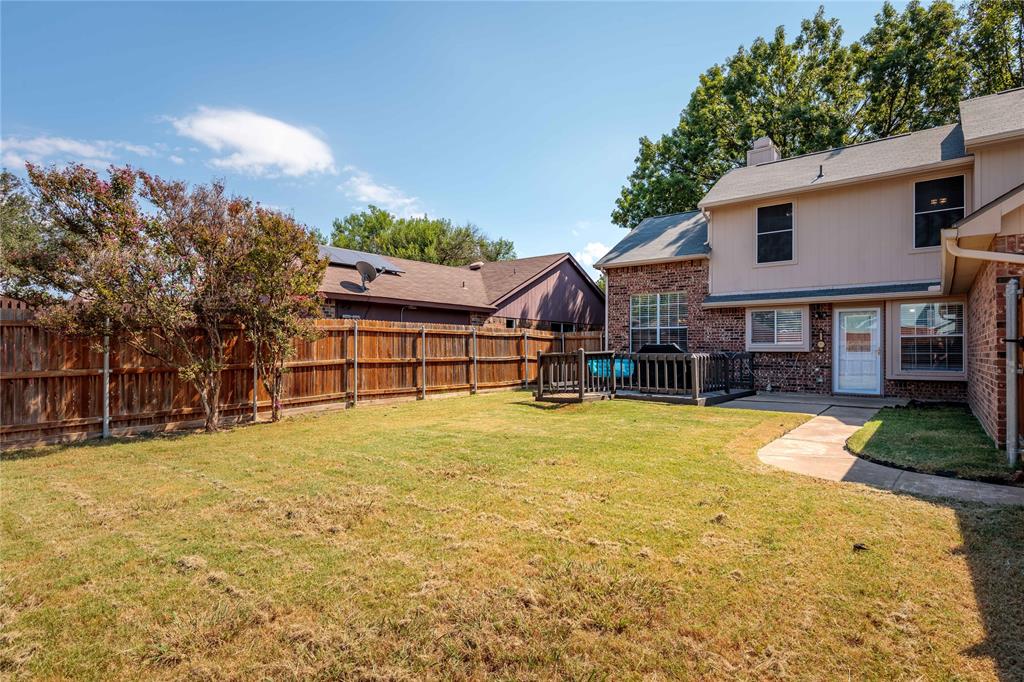 4108 Fryer Street The Colony, TX 75056 - Photo 25 of 27 a view of a house with pool and a yard