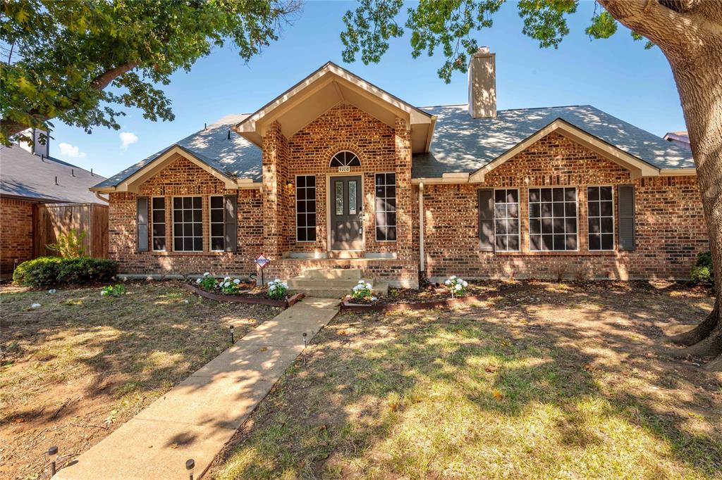 4108 Fryer Street The Colony, TX 75056 - Photo 3 of 27 front view of a house with a yard