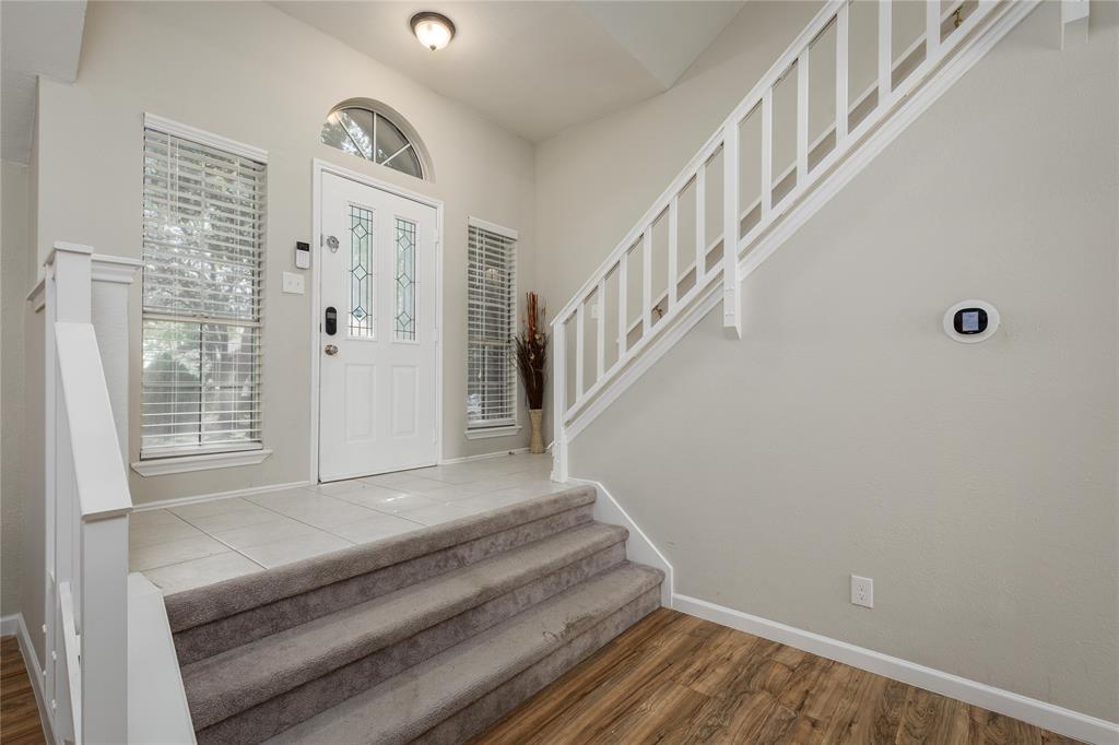 4108 Fryer Street The Colony, TX 75056 - Photo 4 of 27 a view of staircase with white walls and windows