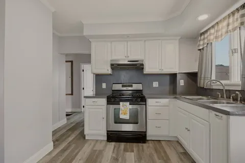 $395,000 | 124 Woodman Street, Fall River, MA 02724