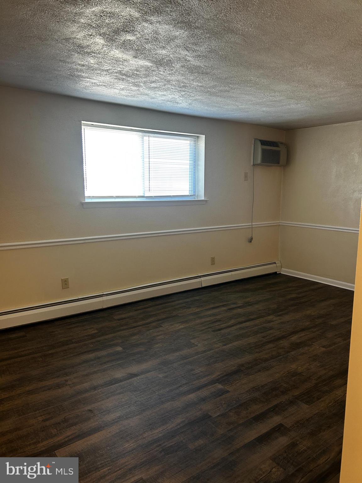 120 North Penn Street, Unit C3 Spring City, PA 19475 - Photo 2 of 8 a view of a room with wooden floor and window