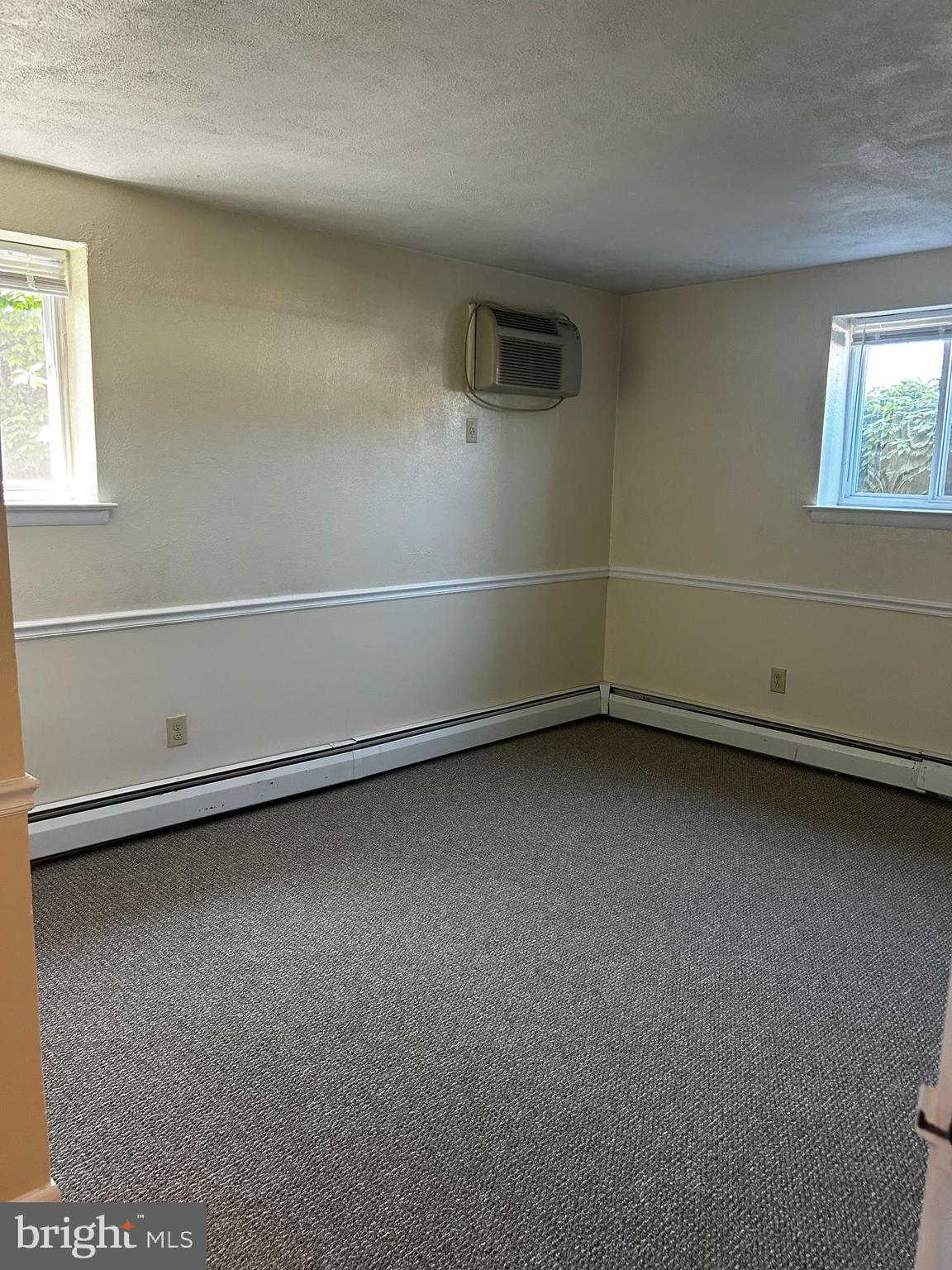 120 North Penn Street, Unit C3 Spring City, PA 19475 - Photo 5 of 8 an empty room with a window