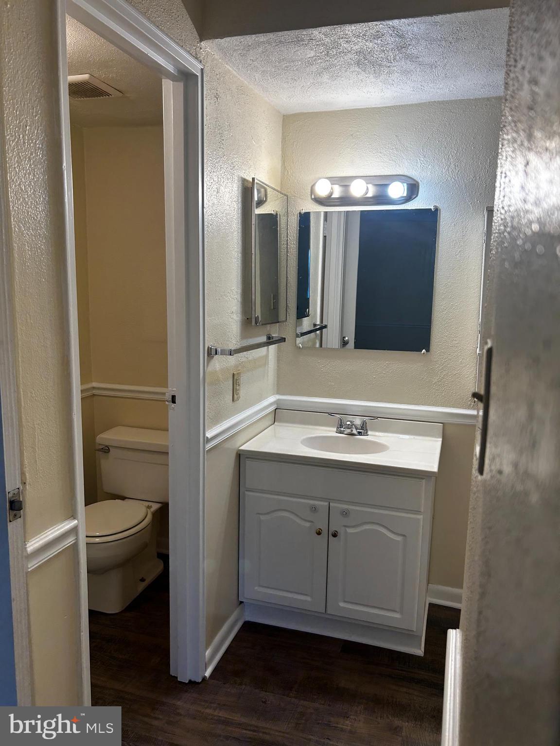 120 North Penn Street, Unit C3 Spring City, PA 19475 - Photo 6 of 8 a bathroom with a sink a toilet a mirror and shower