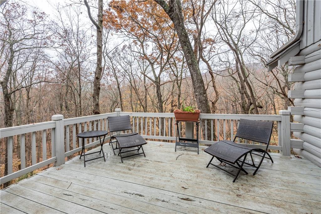 78 Ripple Creek Court Jasper, GA 30143 - Photo 15 of 43 a view of a chairs and bench on the roof deck