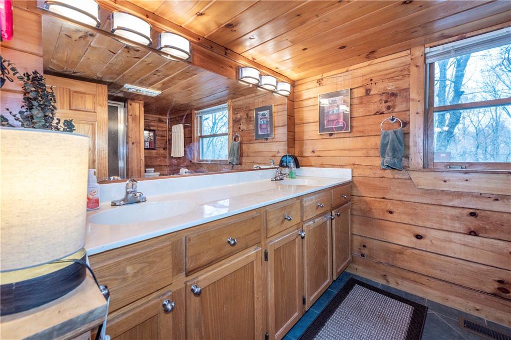 78 Ripple Creek Court Jasper, GA 30143 - Photo 19 of 43 a room with mirror and window