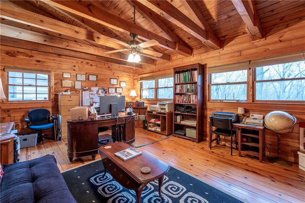 78 Ripple Creek Court Jasper, GA 30143 - Photo 22 of 43 a living room with furniture and wooden floor