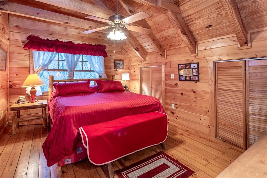 78 Ripple Creek Court Jasper, GA 30143 - Photo 29 of 43 a bedroom with a bed and a window