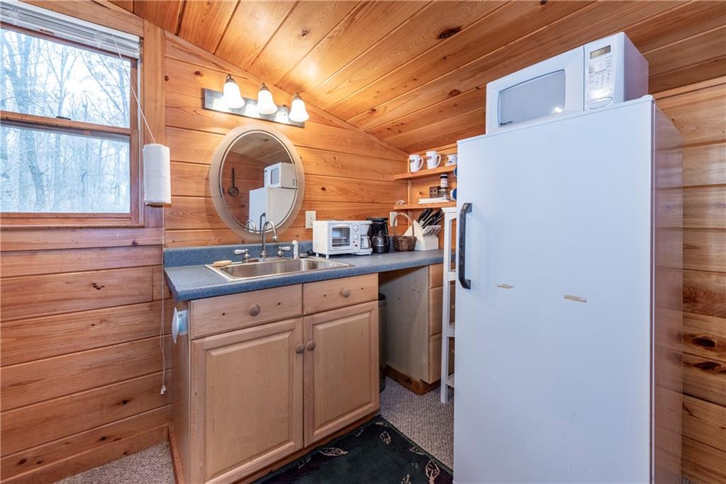 78 Ripple Creek Court Jasper, GA 30143 - Photo 38 of 43 a bathroom with a sink and a mirror
