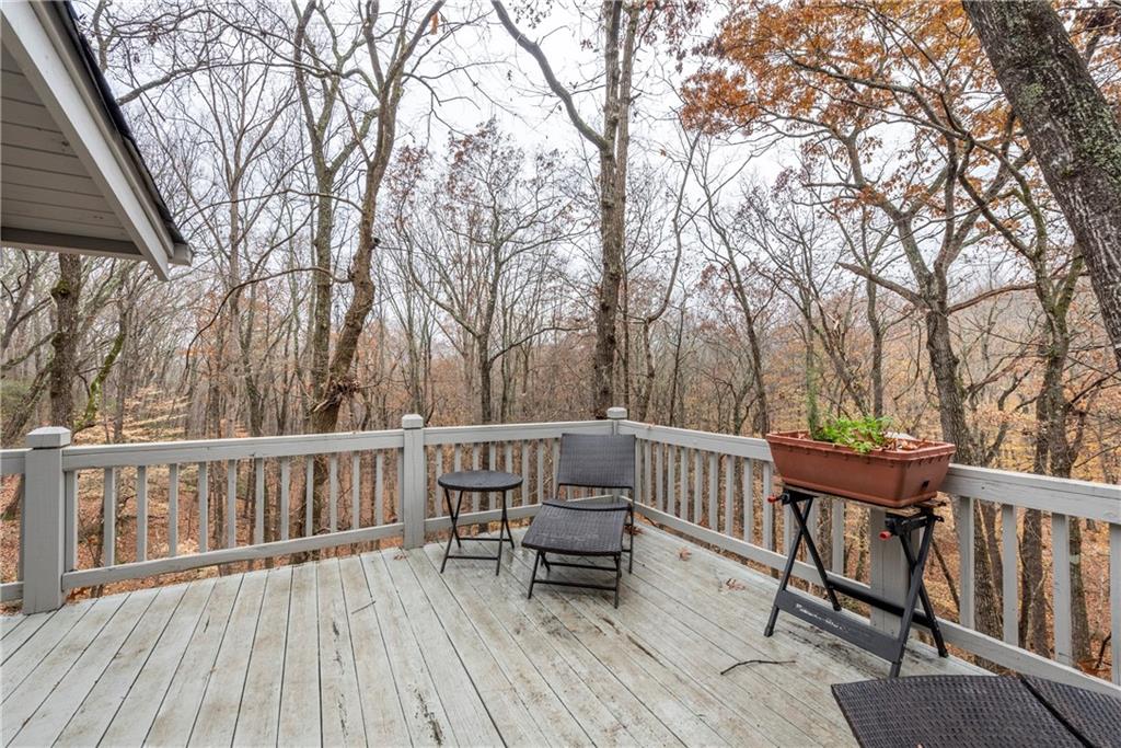 78 Ripple Creek Court Jasper, GA 30143 - Photo 41 of 43 a view of a deck with chairs and wooden fence