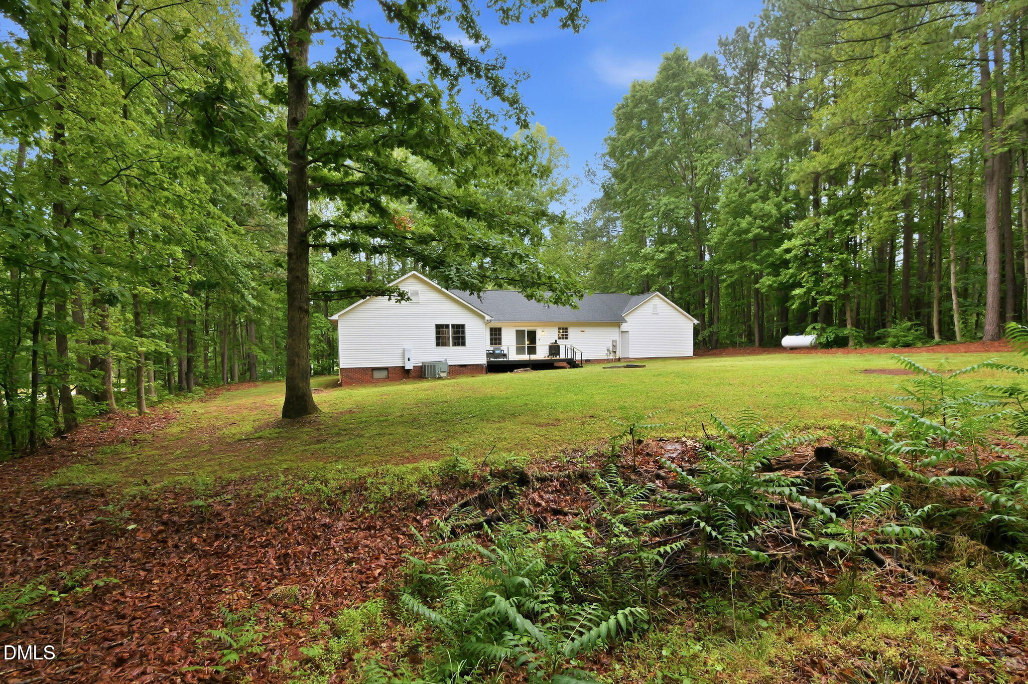 1925 Old Allensville Road Roxboro, NC 27574 - Photo 16 of 58 a view of a house with a yard