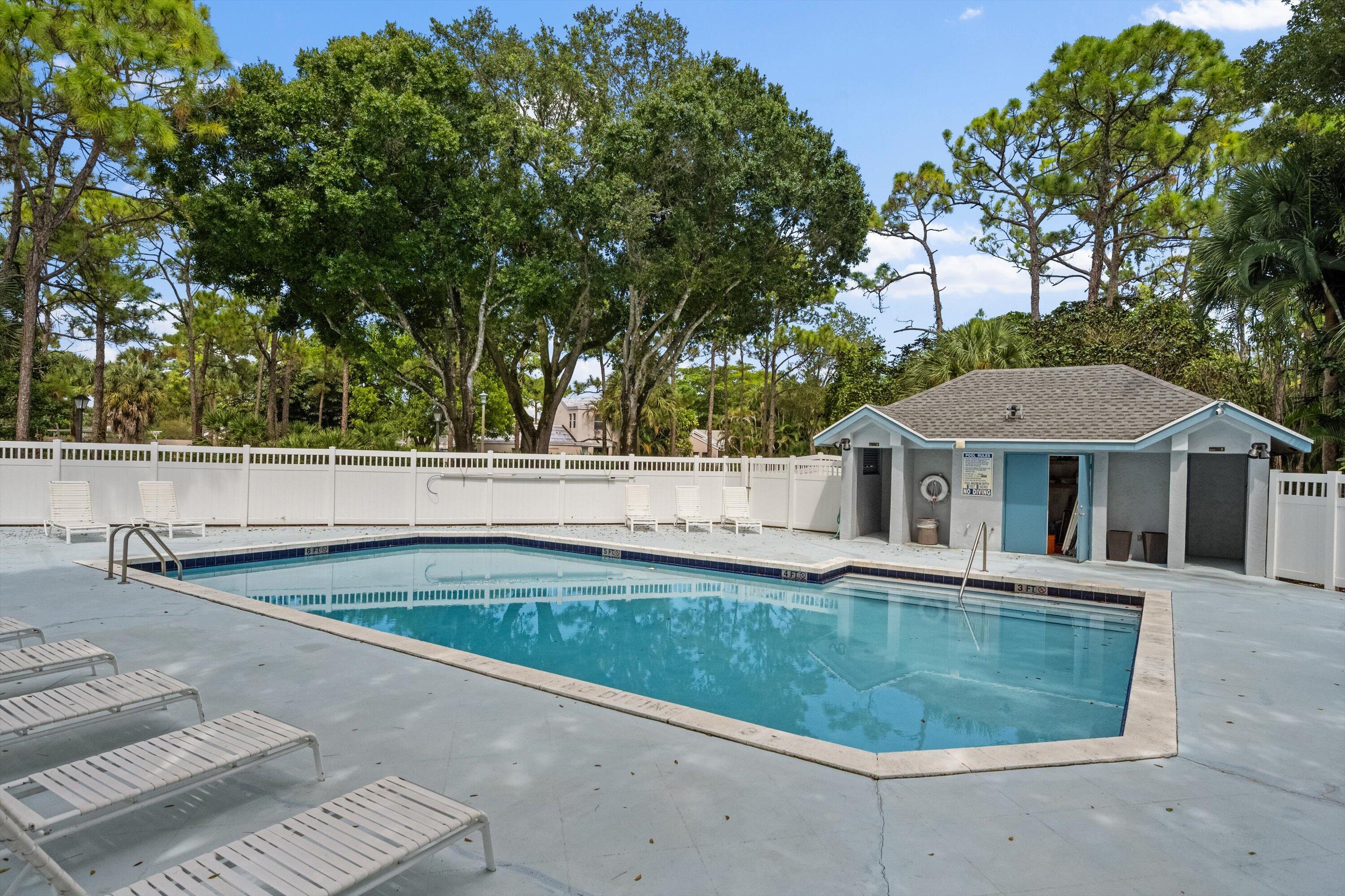 103 Harbour Pointe Way Greenacres, FL 33413 - Photo 24 of 32 front view of a house with a yard