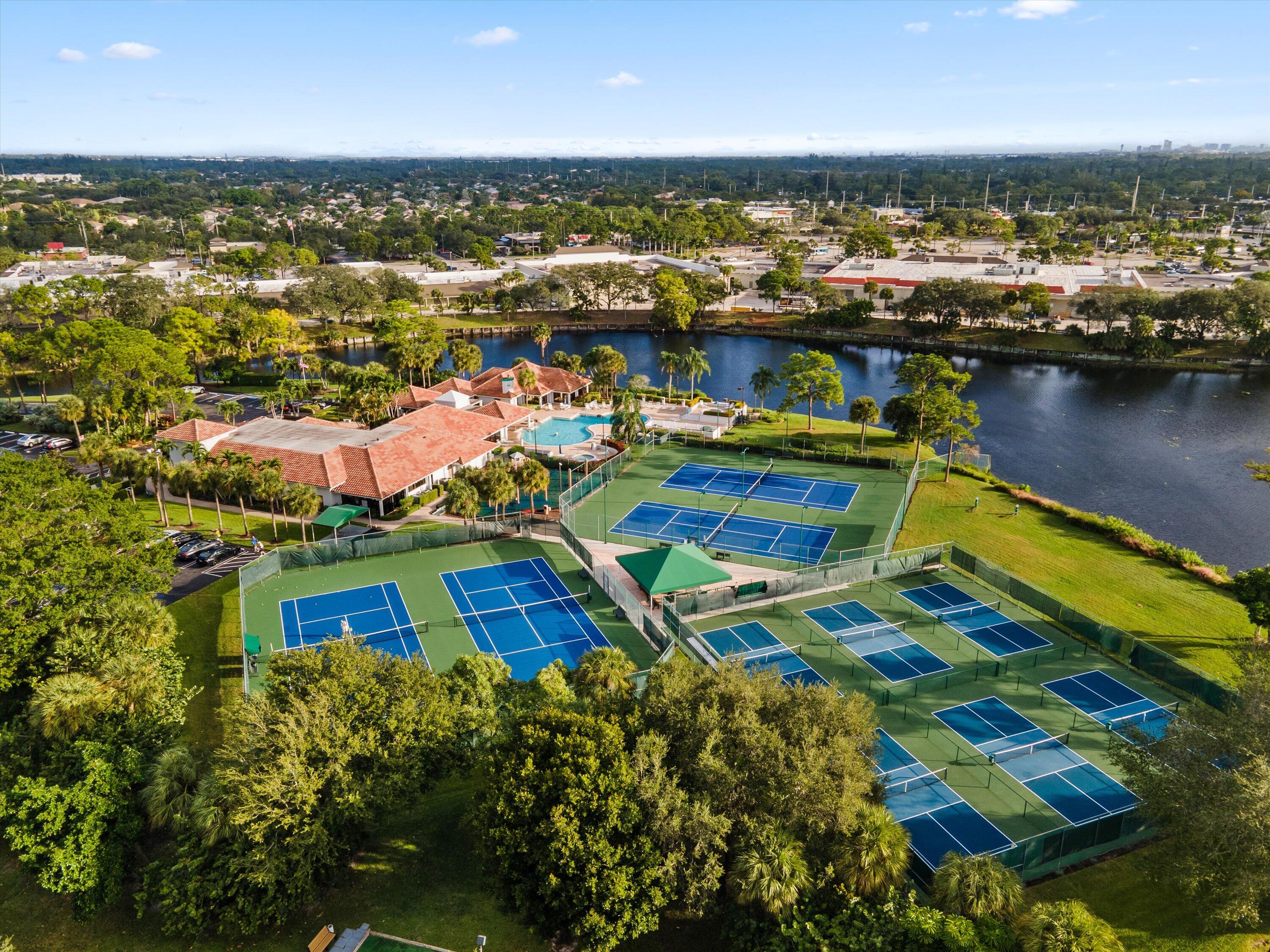 103 Harbour Pointe Way Greenacres, FL 33413 - Photo 25 of 32 an aerial view of residential houses with outdoor space