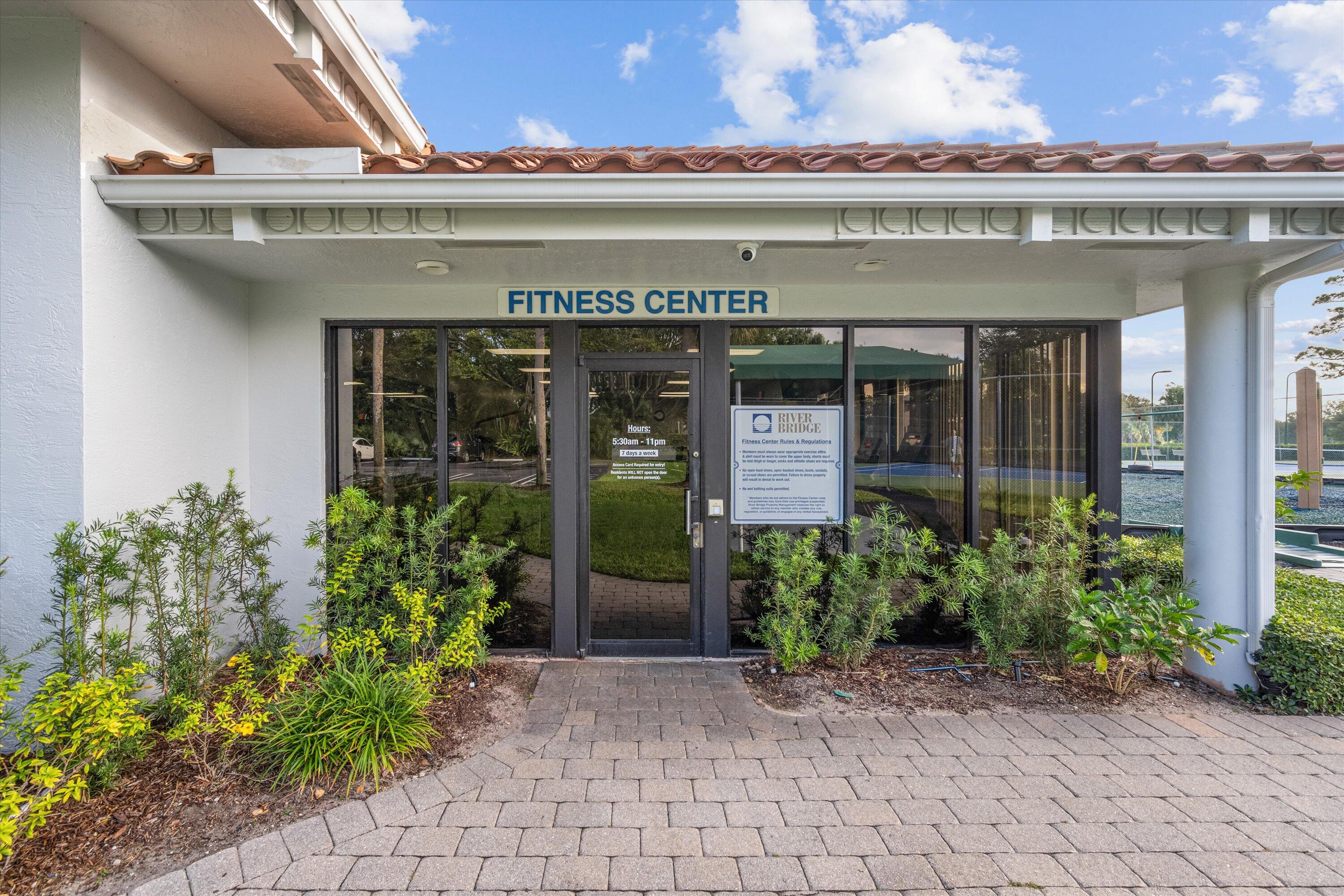 103 Harbour Pointe Way Greenacres, FL 33413 - Photo 26 of 32 a front view of a building