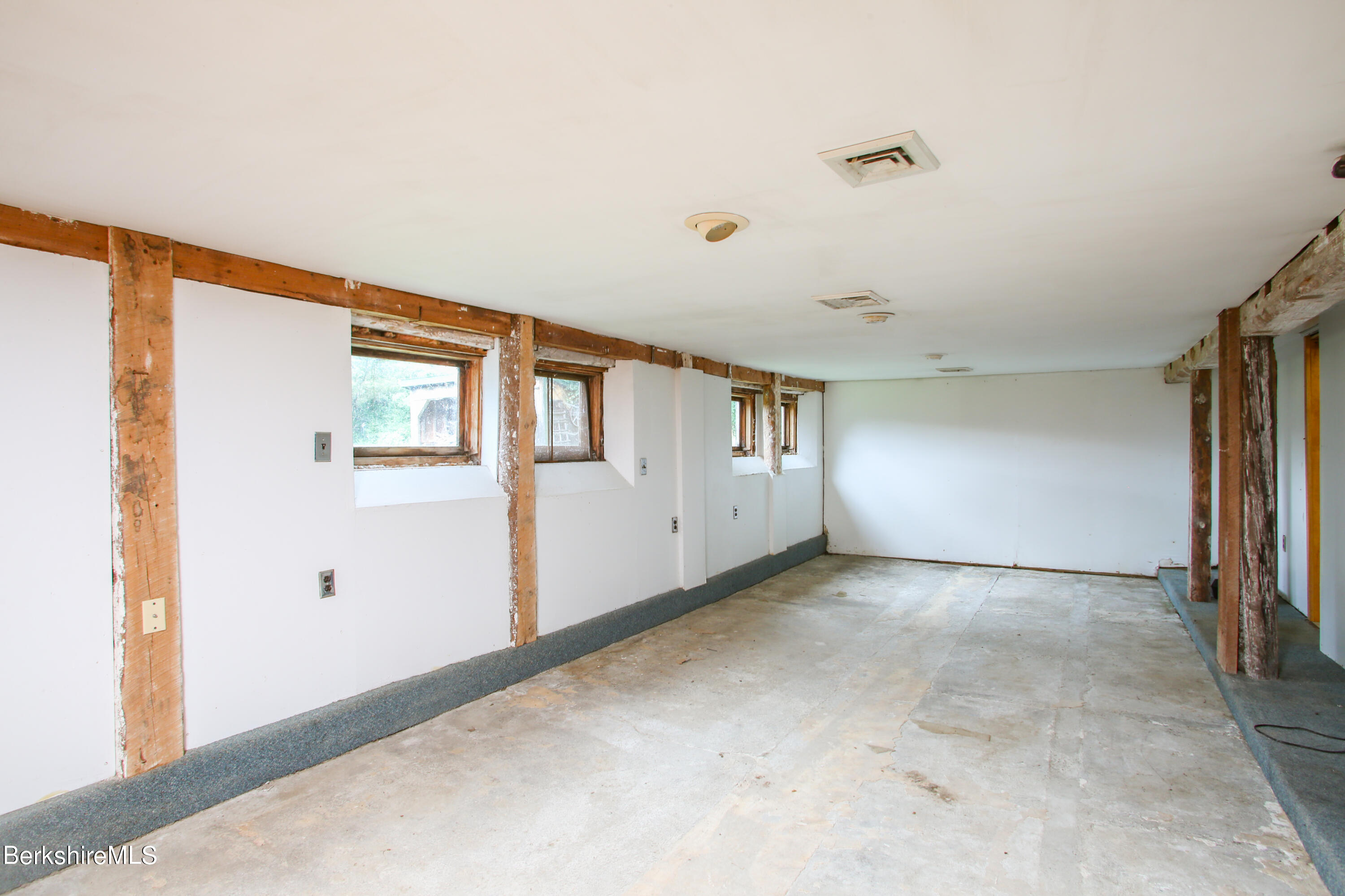 14 S Road Heath, MA 01346 - Photo 20 of 36 a view of a livingroom with wooden floor and windows
