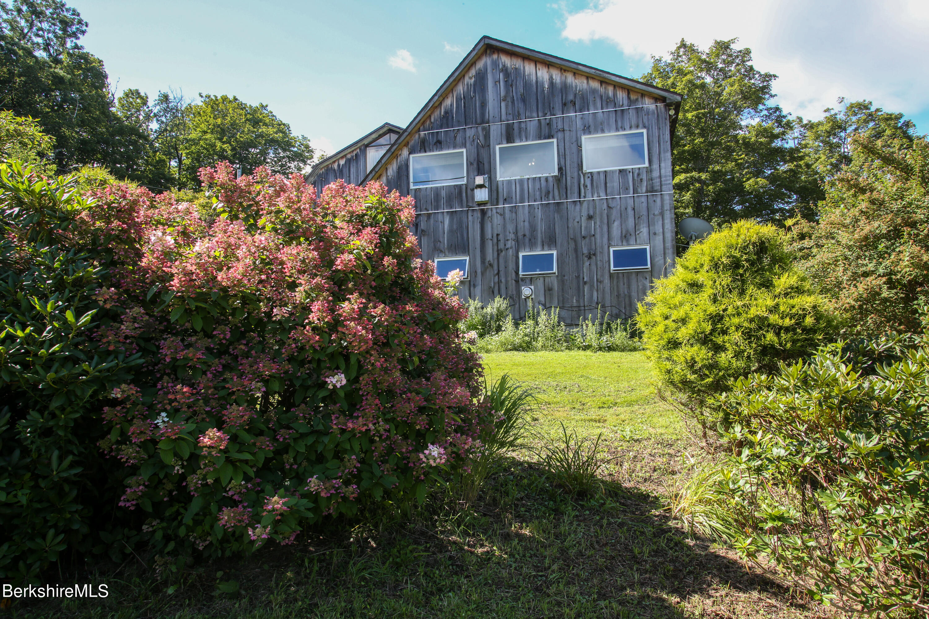 14 S Road Heath, MA 01346 - Photo 31 of 36 a view of a house with a yard and garden
