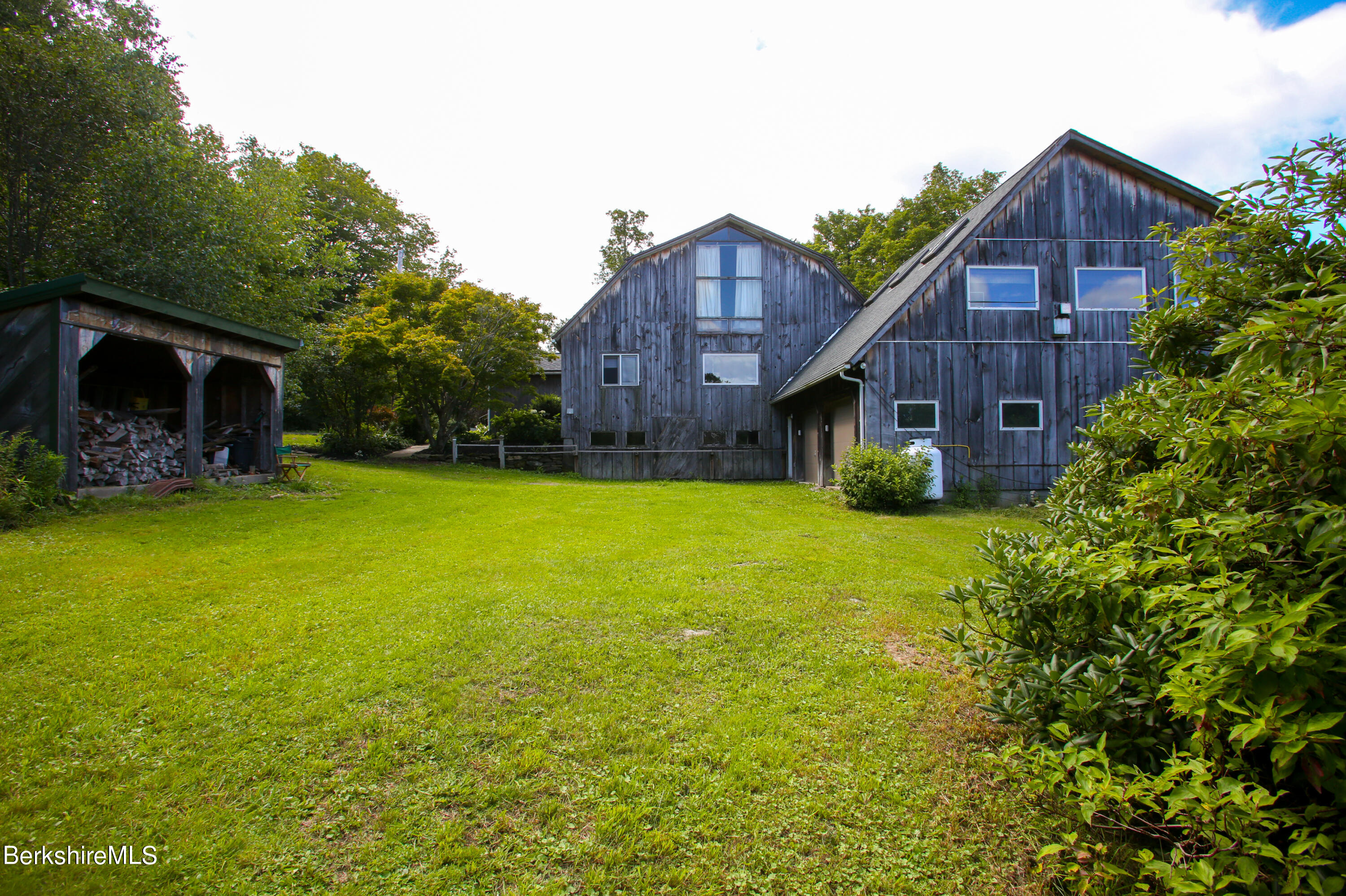 14 S Road Heath, MA 01346 - Photo 33 of 36 a view of a house with a yard and sitting area
