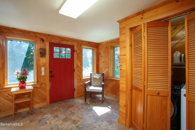 a view of a porch with seating space