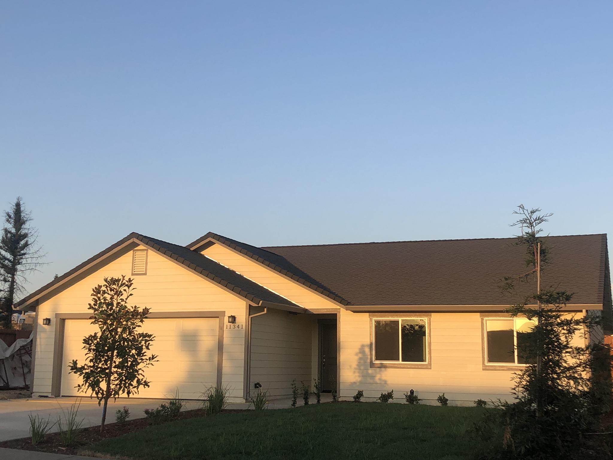 11341 Puffin Way Redding, CA 96003 - Photo 1 of 25 a view of a house with a backyard