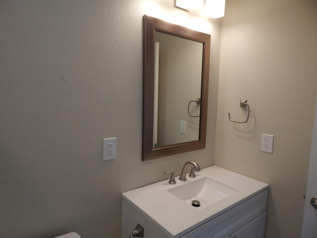 11341 Puffin Way Redding, CA 96003 - Photo 19 of 25 a bathroom with a sink mirror and vanity
