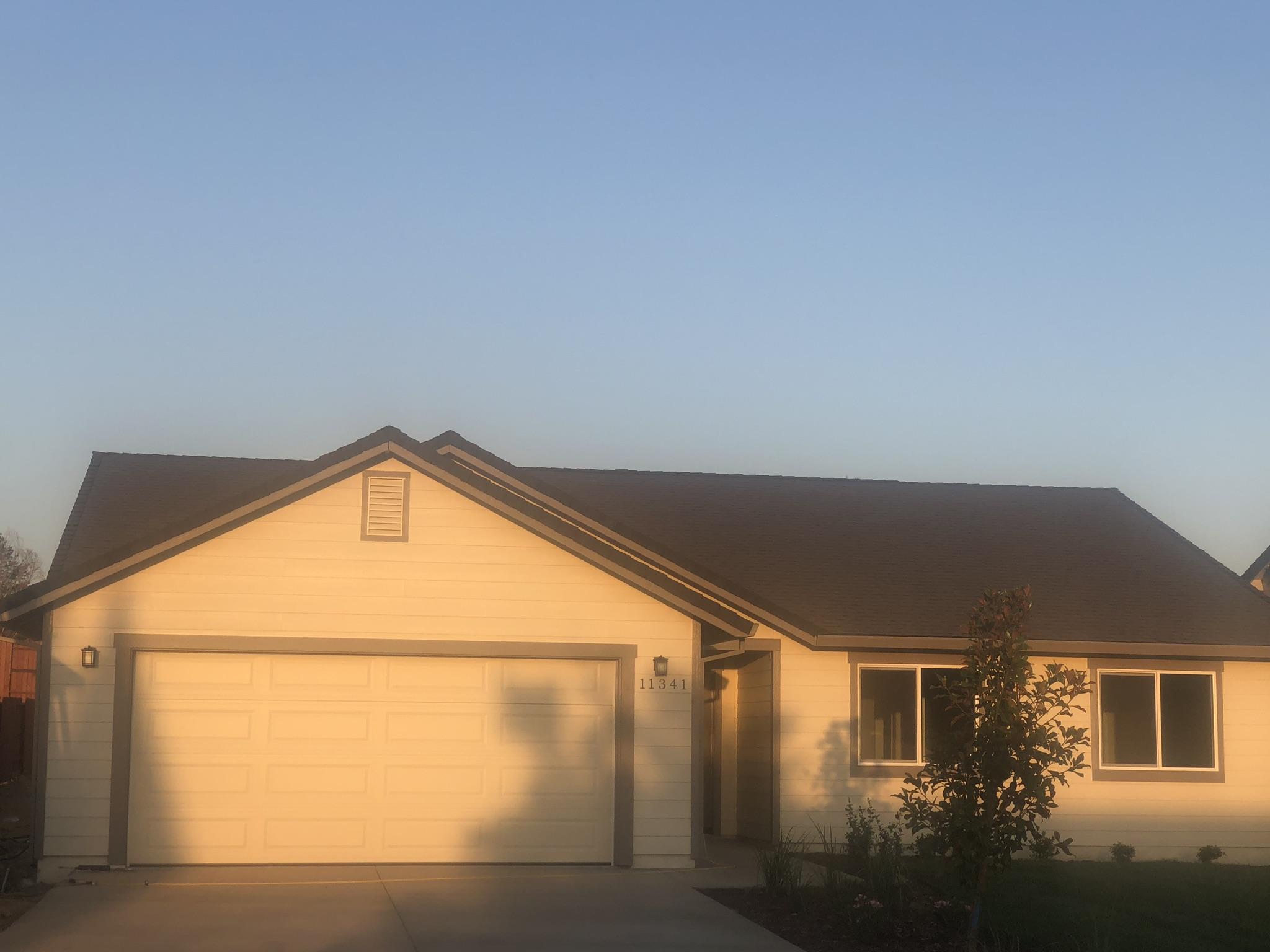 11341 Puffin Way Redding, CA 96003 - Photo 4 of 25 a view of a house with a street