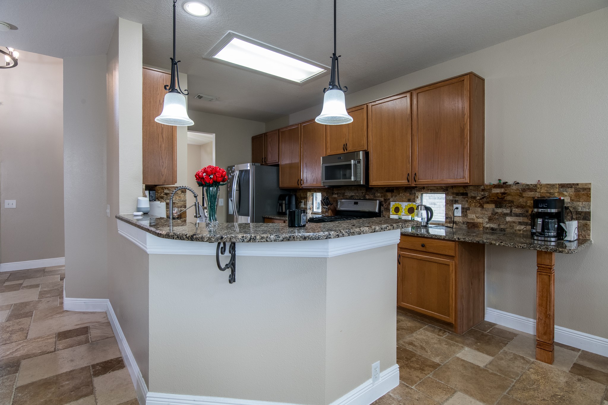 20011 Castlegreen Drive Spring, TX 77388 - Photo 12 of 32 Breakfast bar allows for additional seating.