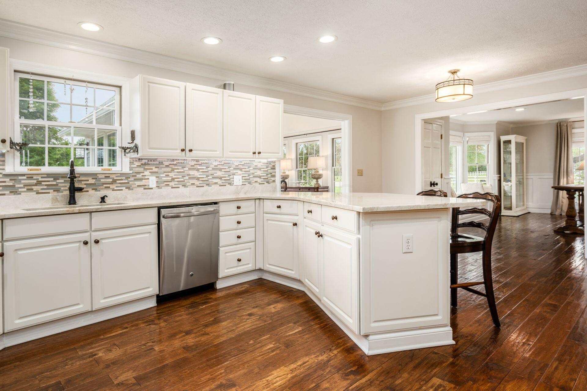 7555 Cook Road Powell, OH 43065 - Photo 61 of 65 Large openings to the sun room and great room