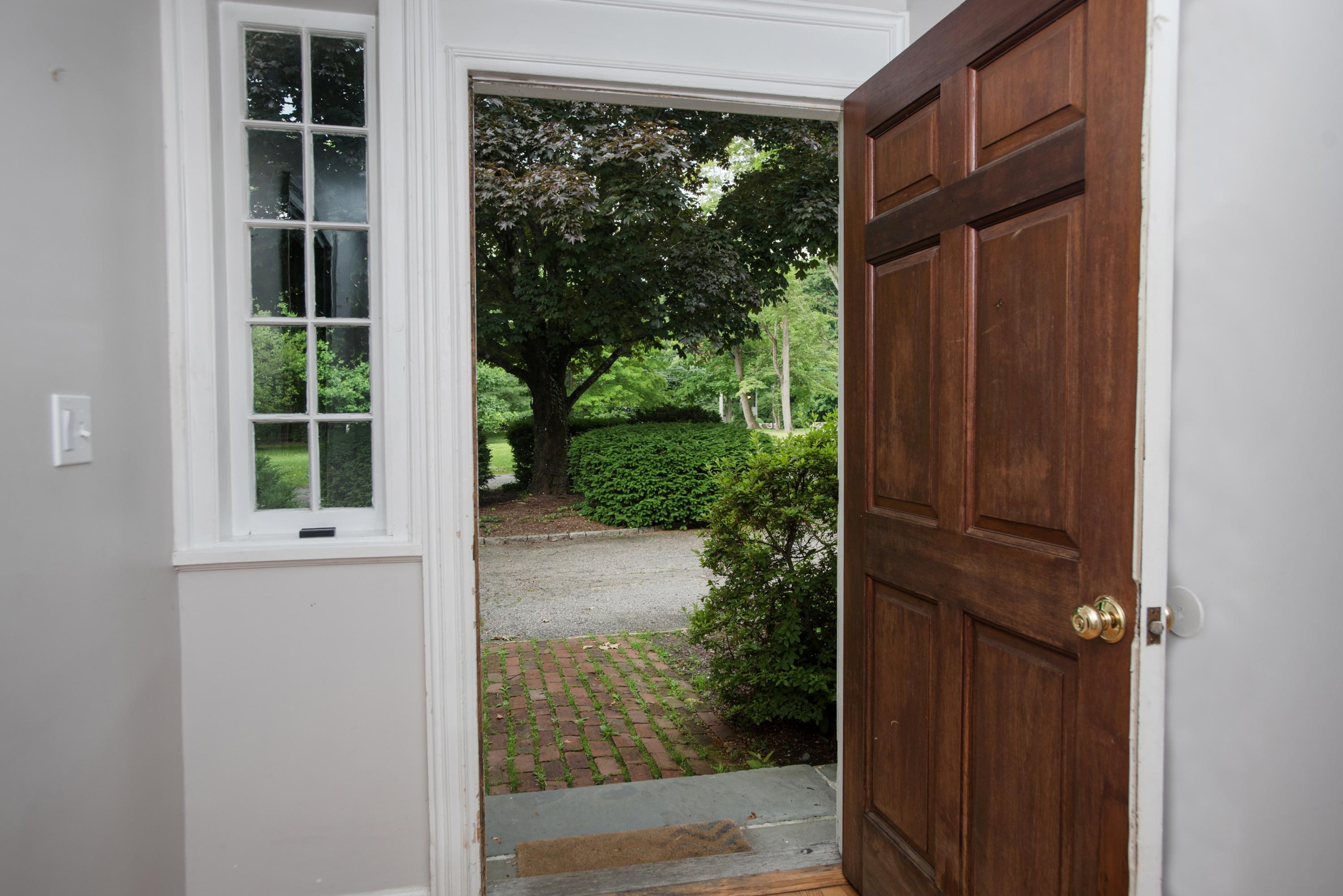 65 Oenoke Ridge New Canaan, CT 06840 - Photo 2 of 22 a view of a door and a window