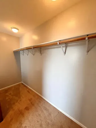 a view of a room with racks on the wall