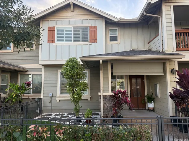 front view of a house with a small yard