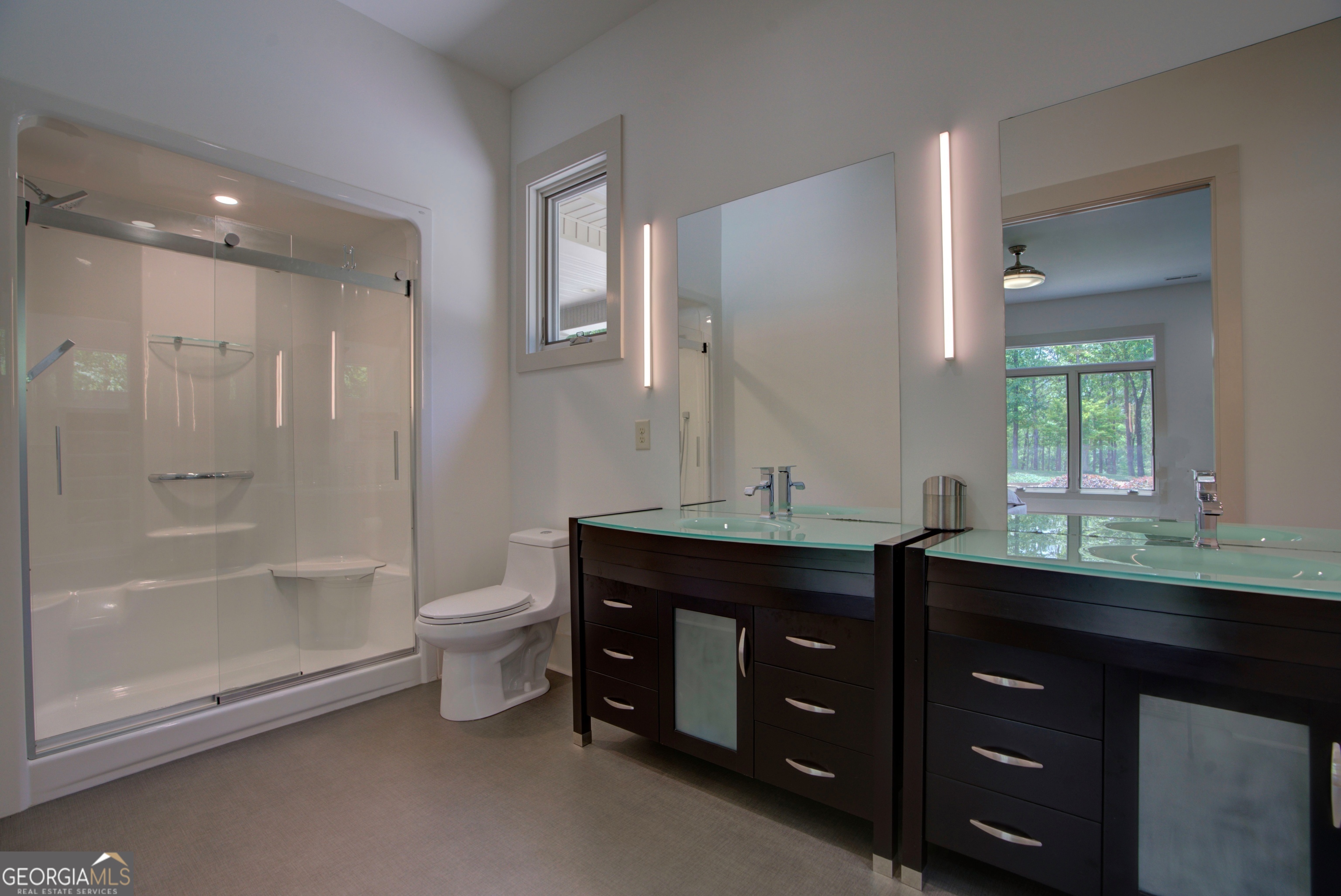 610 Kings Bridge Road Cave Spring, GA 30124 - Photo 19 of 72 a bathroom with a granite countertop sink a toilet and shower