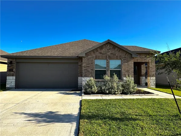 a front view of house with yard