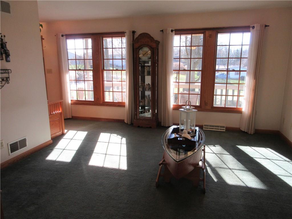 171 Bear Creek Road Prospect, PA 16052 - Photo 14 of 28 a living room with a large window