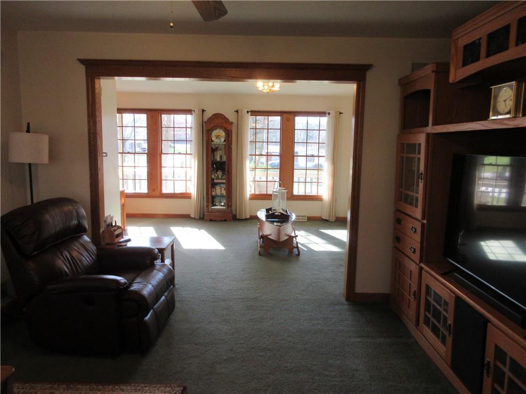 171 Bear Creek Road Prospect, PA 16052 - Photo 17 of 28 a living room with furniture and a flat screen tv