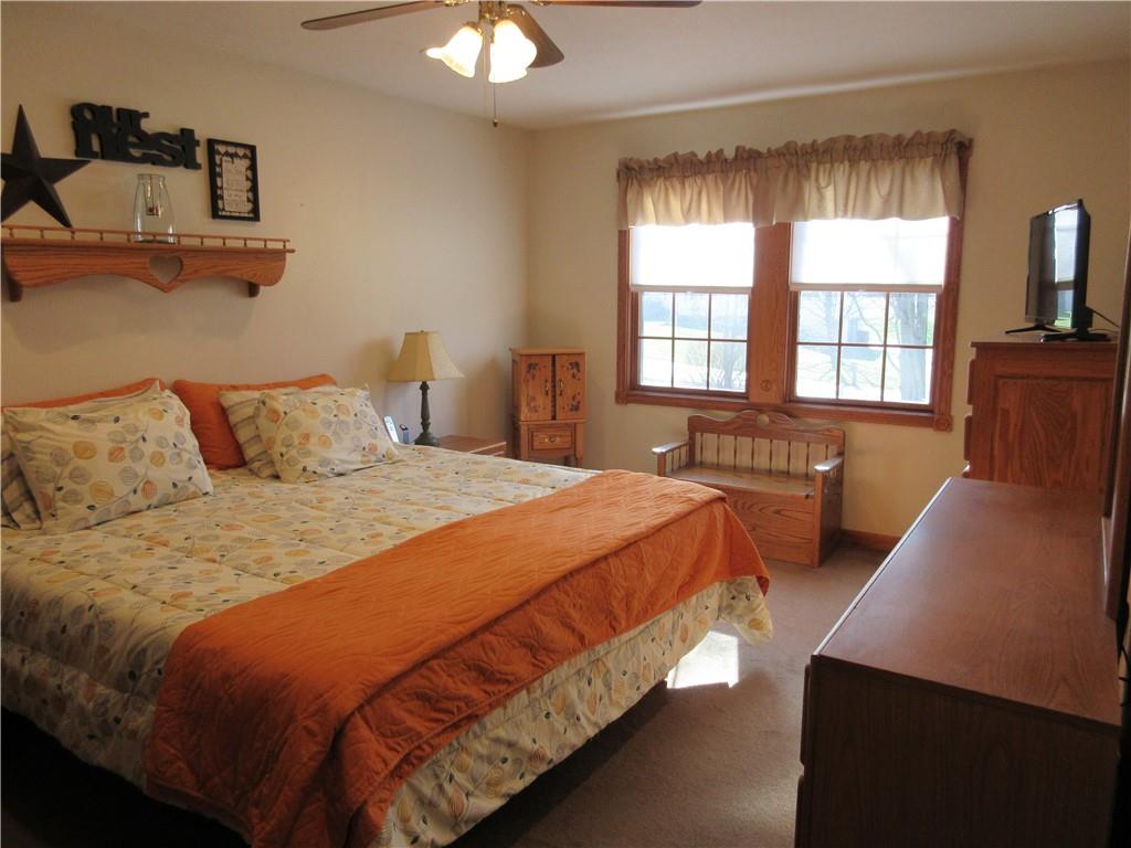 171 Bear Creek Road Prospect, PA 16052 - Photo 18 of 28 a bedroom with a bed and a couch