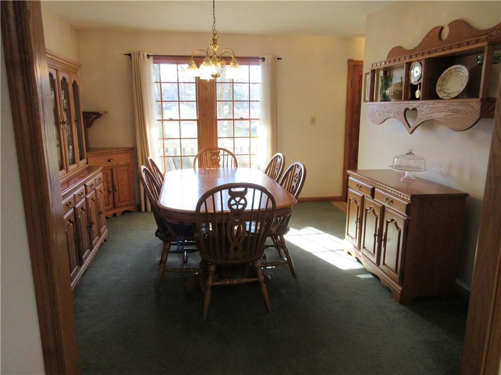 171 Bear Creek Road Prospect, PA 16052 - Photo 25 of 28 a view of a dining room with furniture window and wooden floor