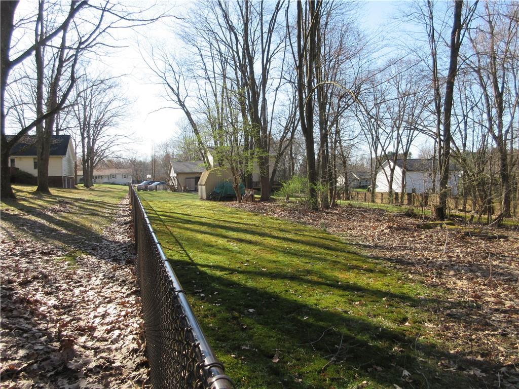 171 Bear Creek Road Prospect, PA 16052 - Photo 7 of 28 a view of a backyard with green space