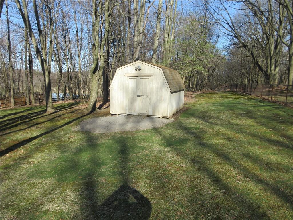 171 Bear Creek Road Prospect, PA 16052 - Photo 9 of 28 a view of a yard with large trees
