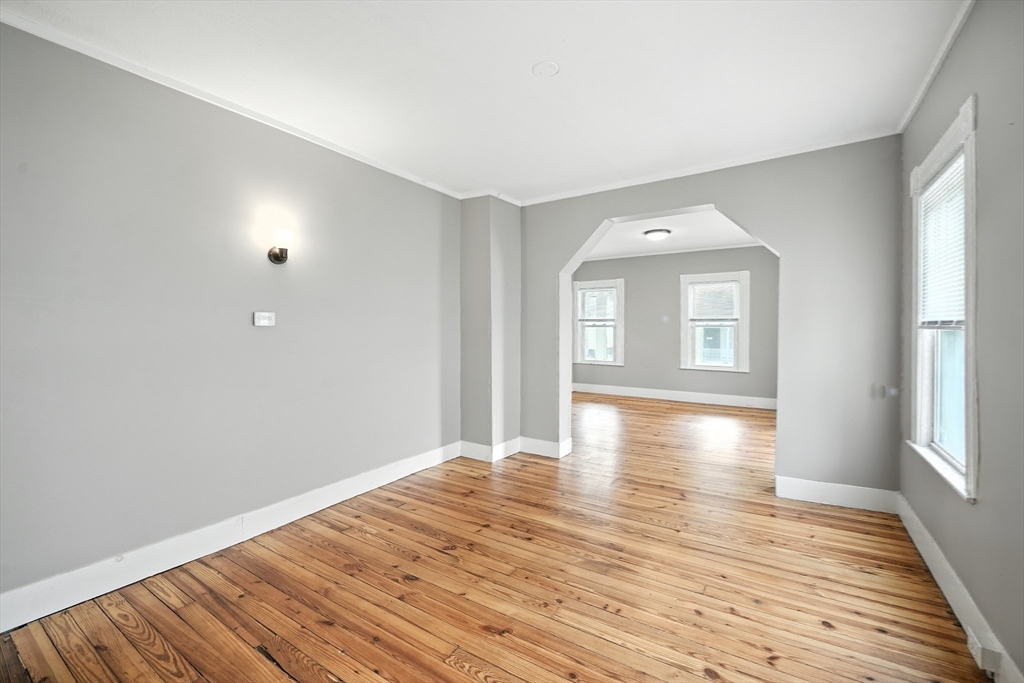 30 Beauchamp Street Springfield, MA 01107 - Photo 16 of 30 wooden floor in an empty room with a window