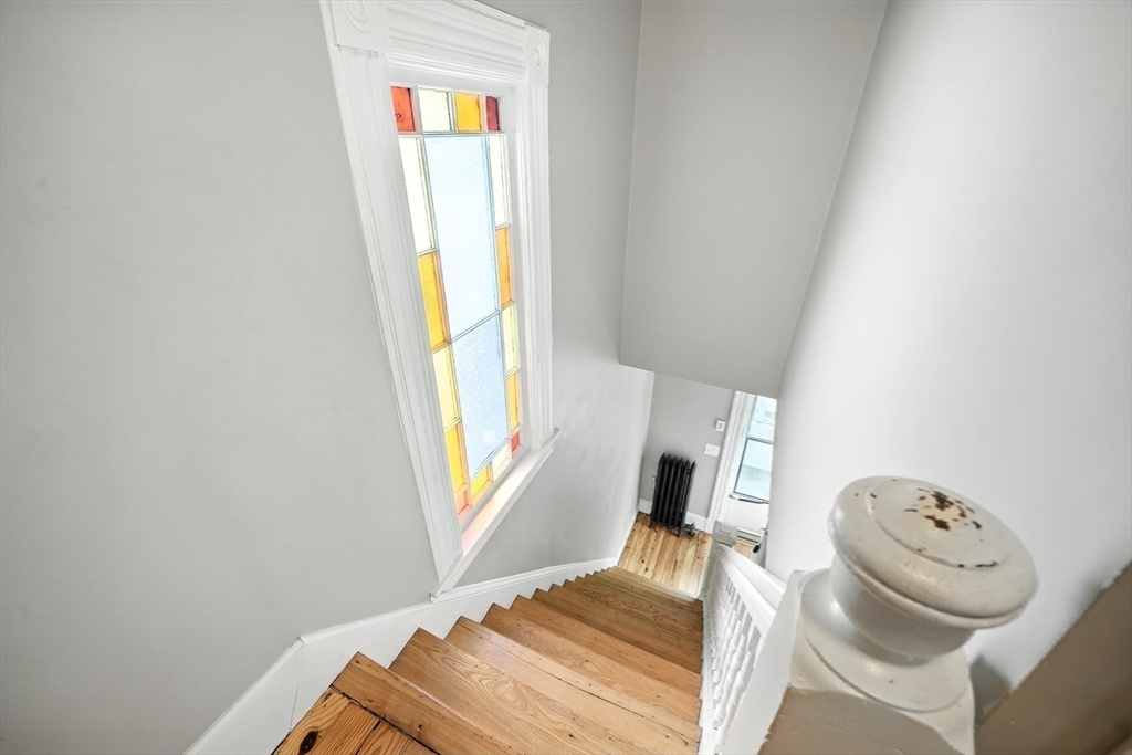 30 Beauchamp Street Springfield, MA 01107 - Photo 17 of 30 a bedroom with a bed and a window